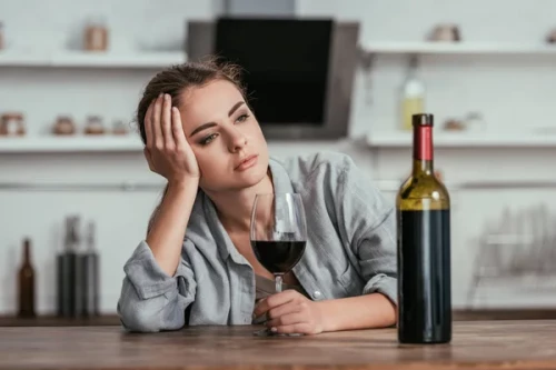depositphotos 321110884 stock photo disappointed woman holding wine glass